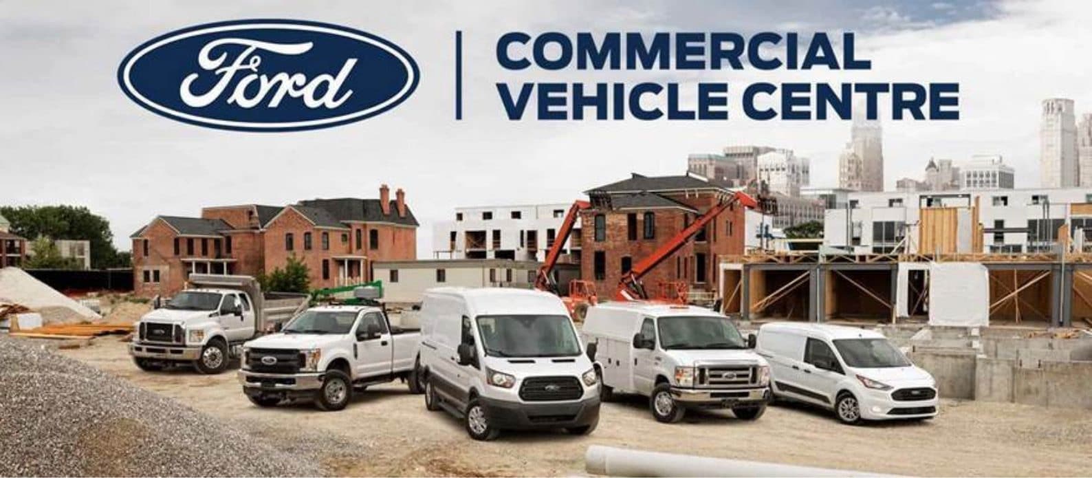 Ford commercial vehicles at a construction site
